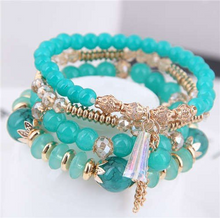 Load image into Gallery viewer, Turquoise green bead and a crystal tassel
