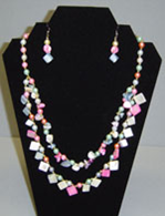 Pearl Colored Necklace and Earring Set.